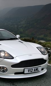 Preview wallpaper aston martin, v12, vanquish, 2004, white, front view, cars, mountains