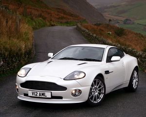 Preview wallpaper aston martin, v12, vanquish, 2004, white, front view, style, nature