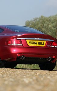 Preview wallpaper aston martin, v12, vanquish, 2004, red, rear view, style, nature