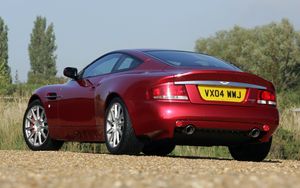 Preview wallpaper aston martin, v12, vanquish, 2004, red, rear view, style, nature