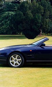 Preview wallpaper aston martin, v8, 1997, blue, side view, cabriolet, house, nature