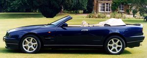 Preview wallpaper aston martin, v8, 1997, blue, side view, cabriolet, house, nature