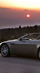 Preview wallpaper aston martin, v8, 2006, gray, side view, cars, trees, sunset