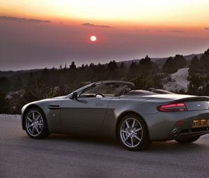 Preview wallpaper aston martin, v8, 2006, gray, side view, cars, trees, sunset