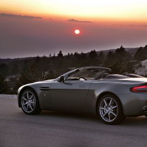 Preview wallpaper aston martin, v8, 2006, gray, side view, cars, trees, sunset