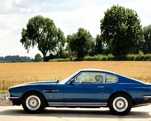 Preview wallpaper aston martin, v8, saloon, 1972, blue, side view, retro, trees