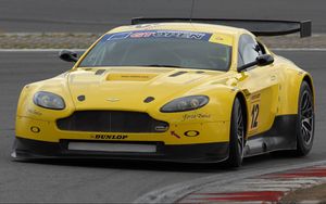 Preview wallpaper aston martin, v8, vantage, 2009, yellow, front view, style, asphalt