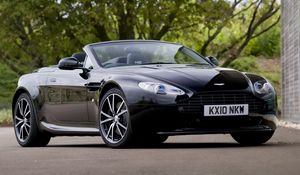 Preview wallpaper aston martin, v8, vantage, 2010, black, front view, car, tree