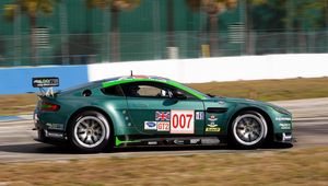 Preview wallpaper aston martin, v8, vantage, 2009, green, side view, sports, speed