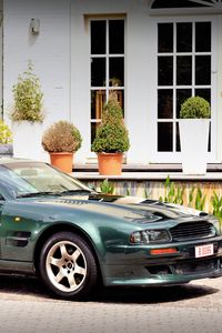 Preview wallpaper aston martin, v8, vantage, 1993, green, side view, style, house