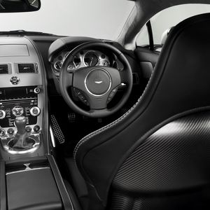 Preview wallpaper aston martin, v8, vantage, 2008, black, salon, interior, steering wheel, speedometer, style