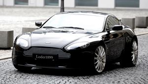 Preview wallpaper aston martin, v8, vantage, 2007, black, front view, style, building