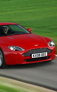 Preview wallpaper aston martin, v8, vantage, 2008, red, front view, grass