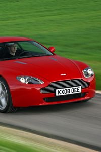 Preview wallpaper aston martin, v8, vantage, 2008, red, front view, grass