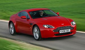 Preview wallpaper aston martin, v8, vantage, 2008, red, front view, grass