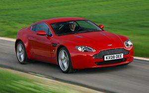 Preview wallpaper aston martin, v8, vantage, 2008, red, front view, grass