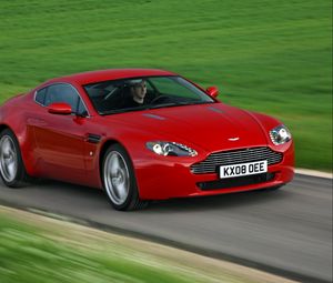 Preview wallpaper aston martin, v8, vantage, 2008, red, front view, grass