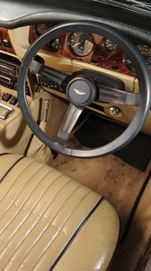 Preview wallpaper aston martin, v8, volante, 1977, beige, salon, interior, steering wheel, speedometer