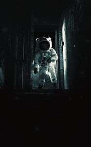 Preview wallpaper astronaut, cosmonaut, gravity, spacesuit, door, dark