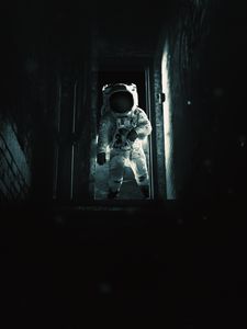 Preview wallpaper astronaut, cosmonaut, gravity, spacesuit, door, dark