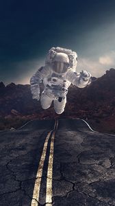 Preview wallpaper astronaut, gravity, road, asphalt, rocks, stones