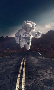 Preview wallpaper astronaut, gravity, road, asphalt, rocks, stones