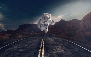 Preview wallpaper astronaut, gravity, road, asphalt, rocks, stones