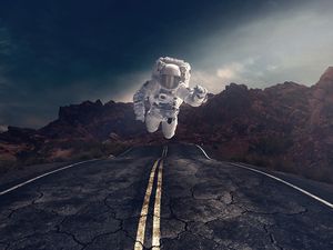 Preview wallpaper astronaut, gravity, road, asphalt, rocks, stones