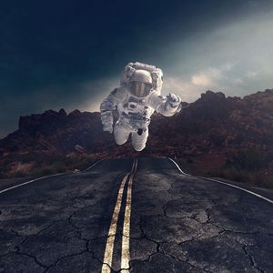 Preview wallpaper astronaut, gravity, road, asphalt, rocks, stones