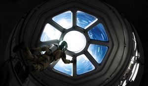 Preview wallpaper astronaut, porthole, space, spacecraft, weightlessness, gravity