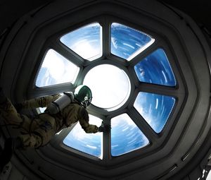 Preview wallpaper astronaut, porthole, space, spacecraft, weightlessness, gravity