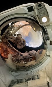 Preview wallpaper astronaut, reflection, helmet, spacesuit, space