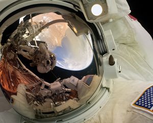 Preview wallpaper astronaut, reflection, helmet, spacesuit, space