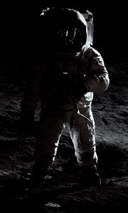 Preview wallpaper astronaut, spacesuit, dark, space