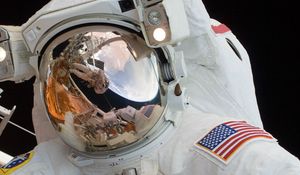 Preview wallpaper astronaut, spacesuit, helmet, mirror, reflection, space