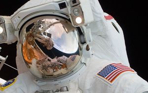 Preview wallpaper astronaut, spacesuit, helmet, mirror, reflection, space