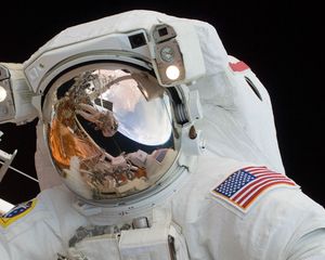 Preview wallpaper astronaut, spacesuit, helmet, mirror, reflection, space