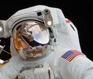 Preview wallpaper astronaut, spacesuit, helmet, mirror, reflection, space