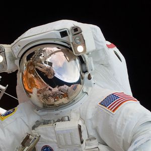 Preview wallpaper astronaut, spacesuit, helmet, mirror, reflection, space