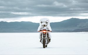 Preview wallpaper astronaut, spacesuit, motorcycle