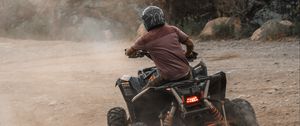 Preview wallpaper atv, man, helmet, dust, dirt