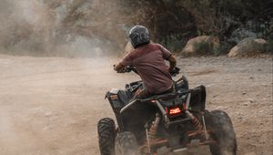 Preview wallpaper atv, man, helmet, dust, dirt