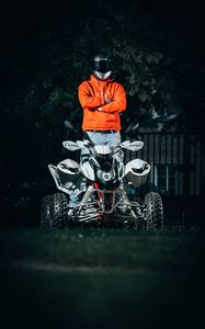 Preview wallpaper atv, motorcyclist, helmet, bike, front view, hoodie