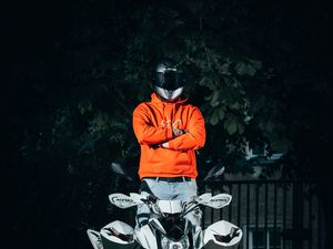 Preview wallpaper atv, motorcyclist, helmet, bike, front view, hoodie