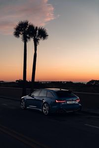 Preview wallpaper audi, car, blue, road, dusk, palm trees