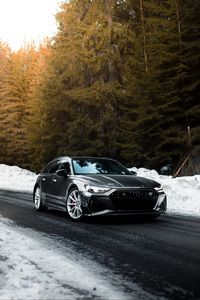 Preview wallpaper audi, car, gray, speed, road, snow, winter