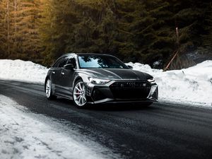 Preview wallpaper audi, car, gray, speed, road, snow, winter