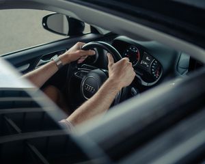 Preview wallpaper audi, car, hands, steering wheel