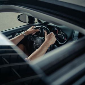 Preview wallpaper audi, car, hands, steering wheel