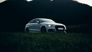 Preview wallpaper audi, car, white, grass, nature